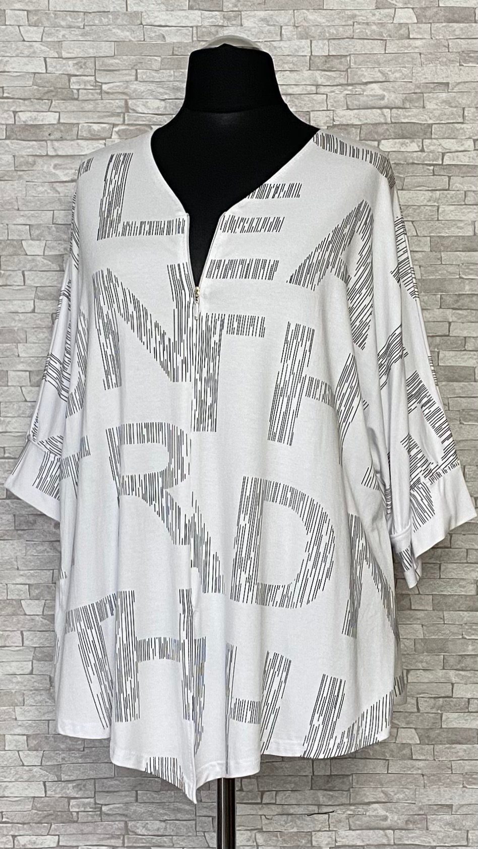 biała bluzka new jersey fashion z zamkiem biała bluzka new jersey fashion z zamkiem