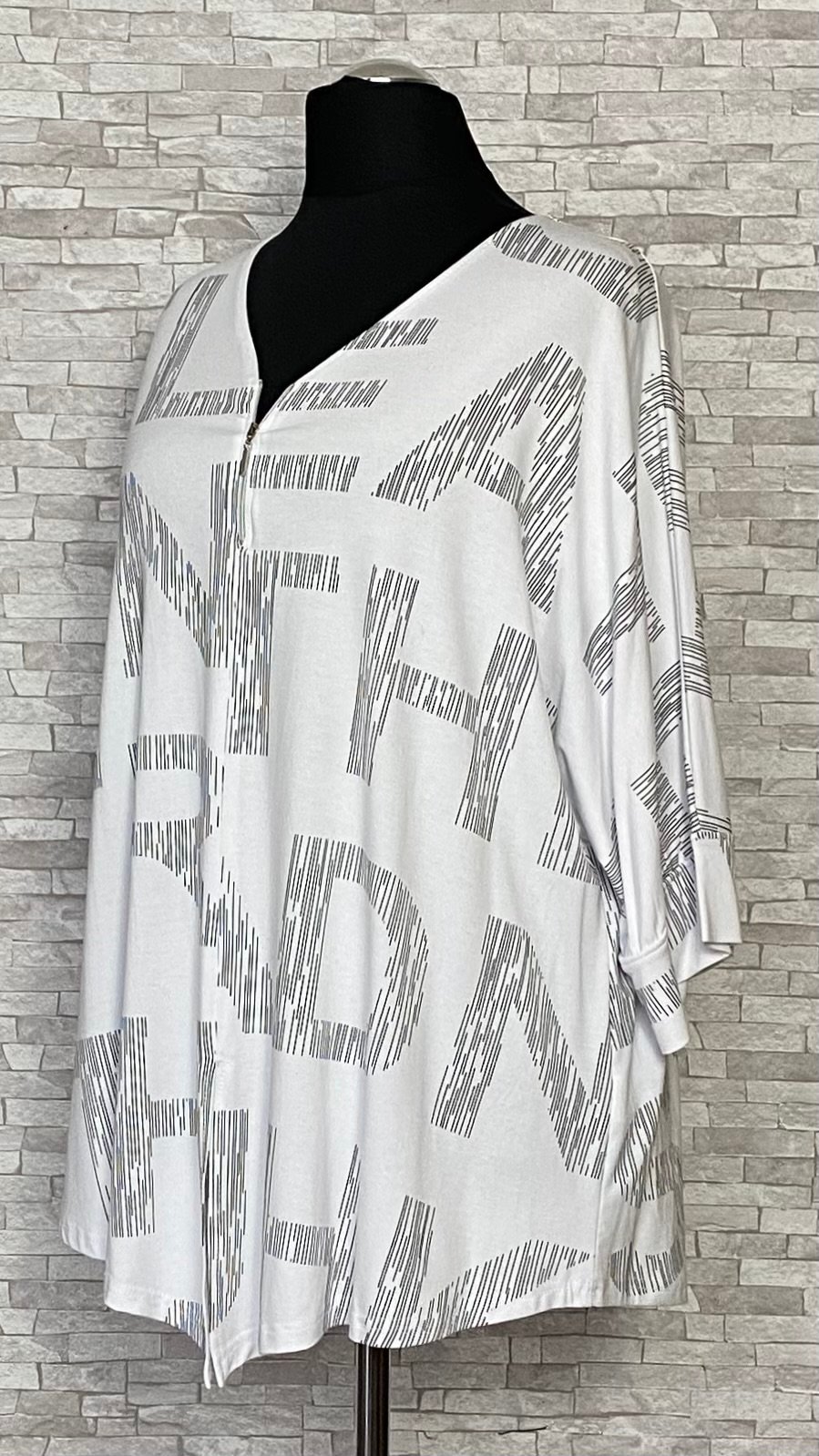 biała bluzka new jersey fashion z zamkiem biała bluzka new jersey fashion z zamkiem