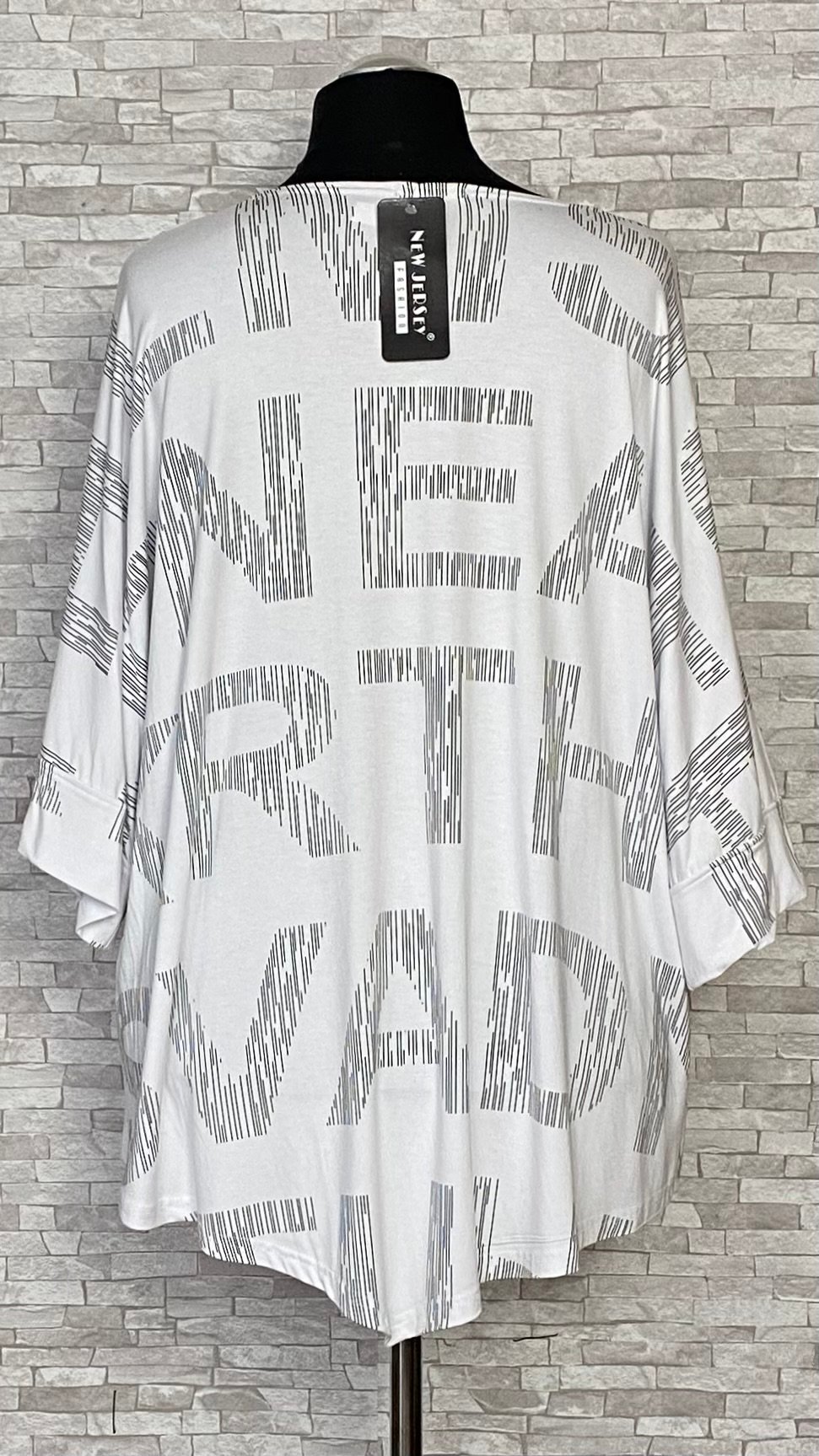 biała bluzka new jersey fashion z zamkiem biała bluzka new jersey fashion z zamkiem